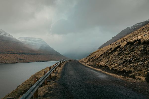 Person moving gracefully in a bright, open space.